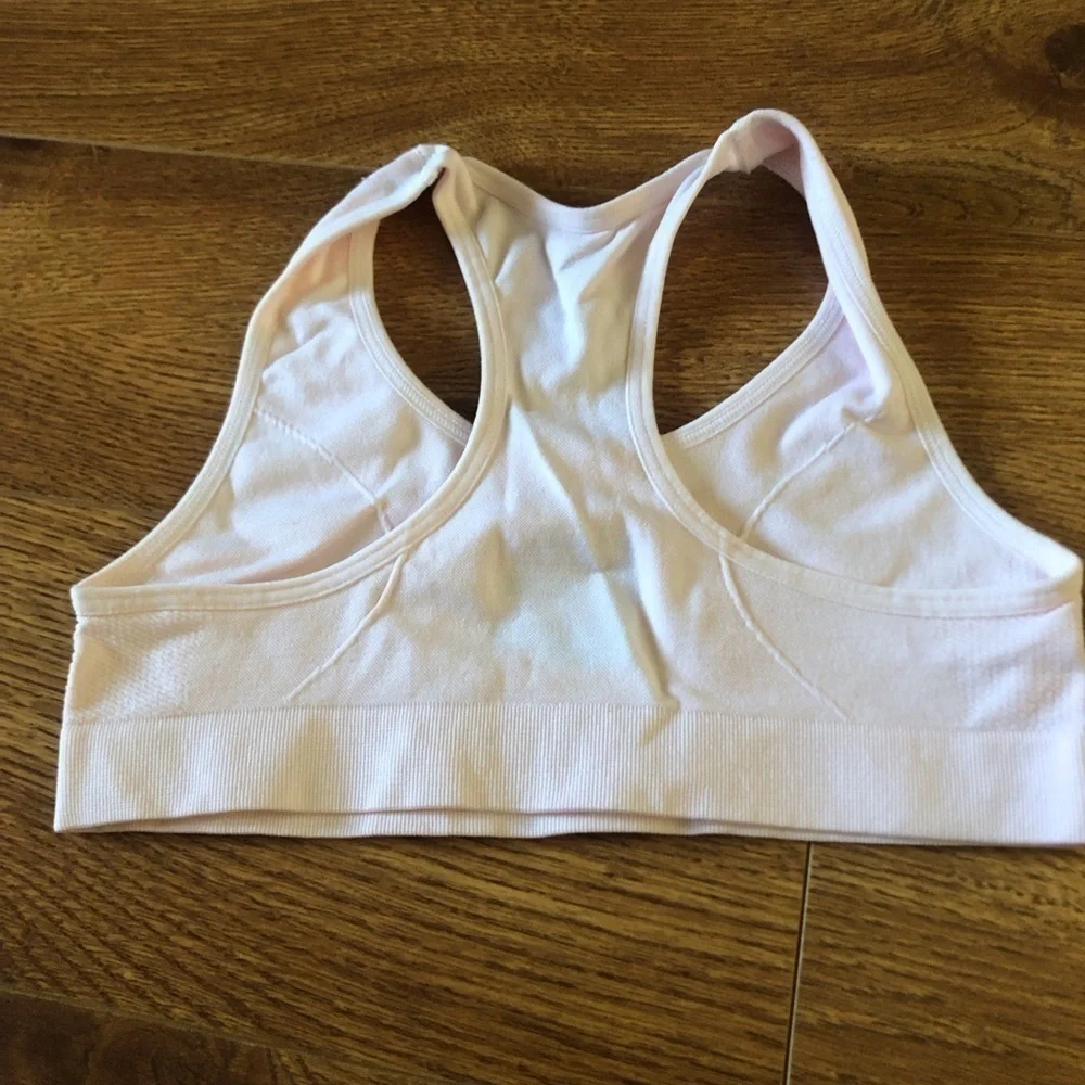 Cat & Jack light pink sports bra in size S